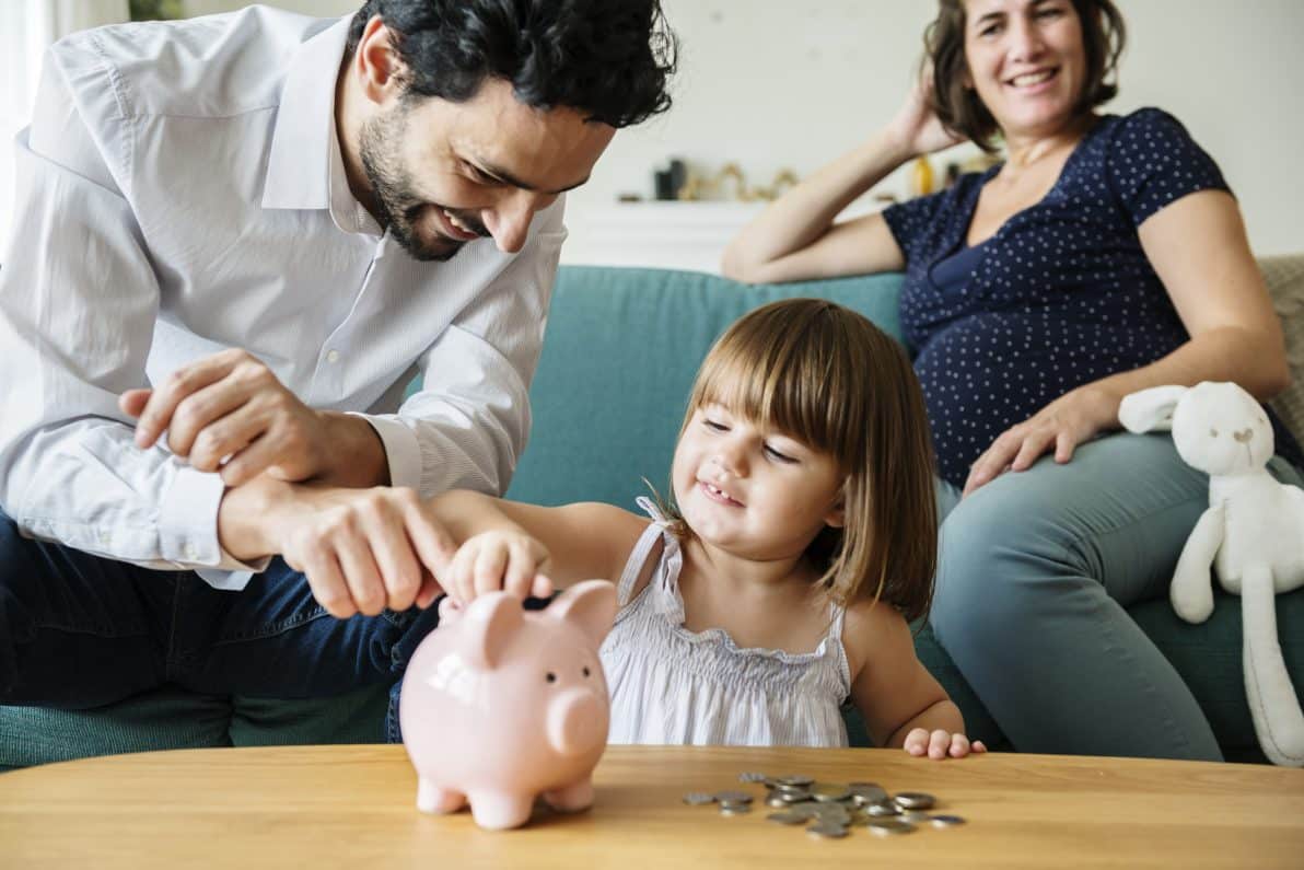 family saving money in piggy bank 2022 12 16 00 18 13 utc